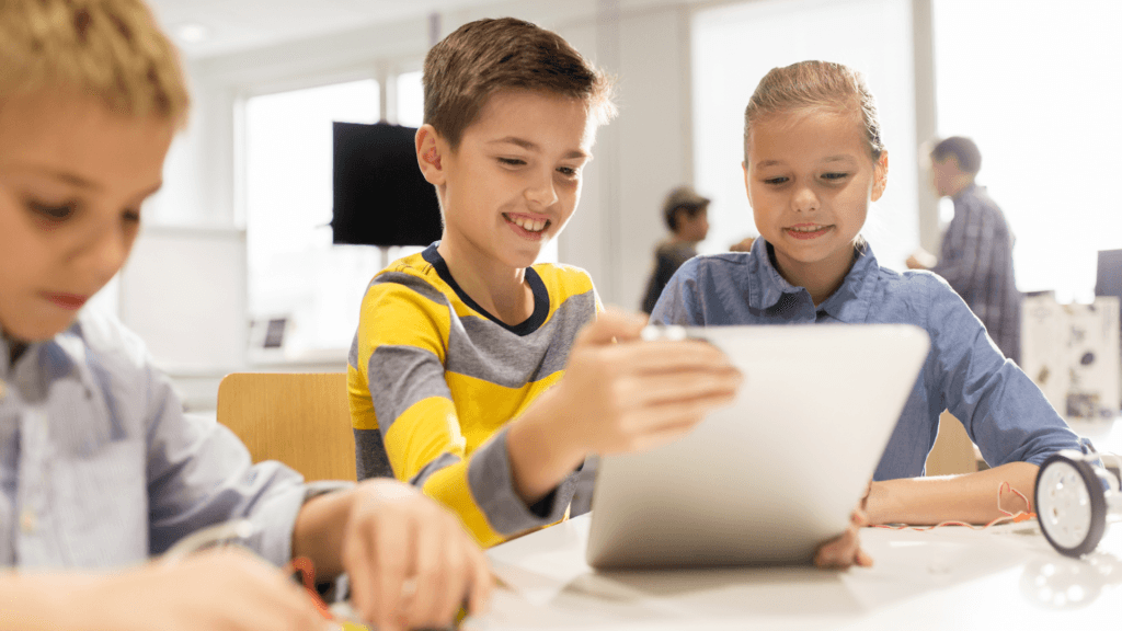 kids using the tablet to surf on the internet